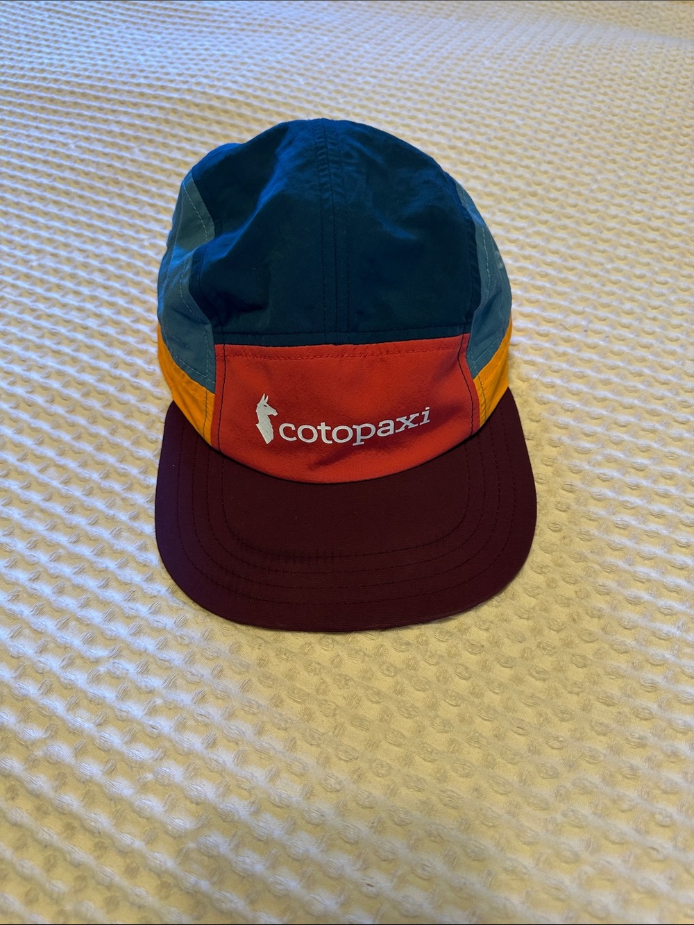 cotopaxi teal/orange/burgundy colorblock five-panel cap